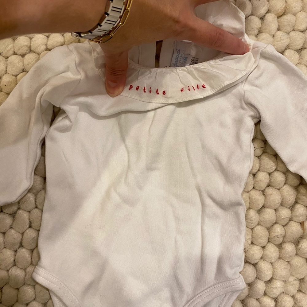Jacadi petit fille (“little girl”) onesie